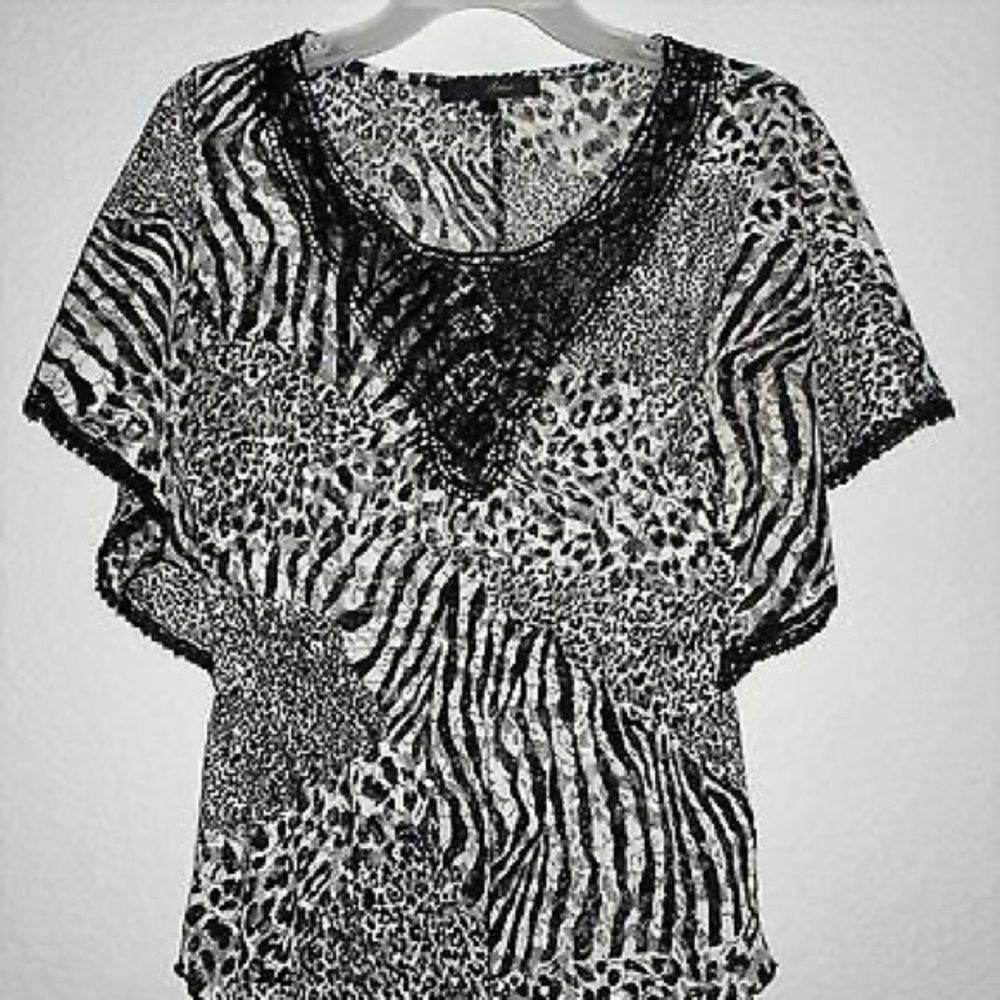 HEARTSOUL FABULOUS ANIMAL PRINT STRETCH BLOUSE